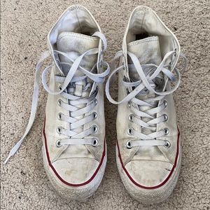 Well loved white Chuck Taylor high tops